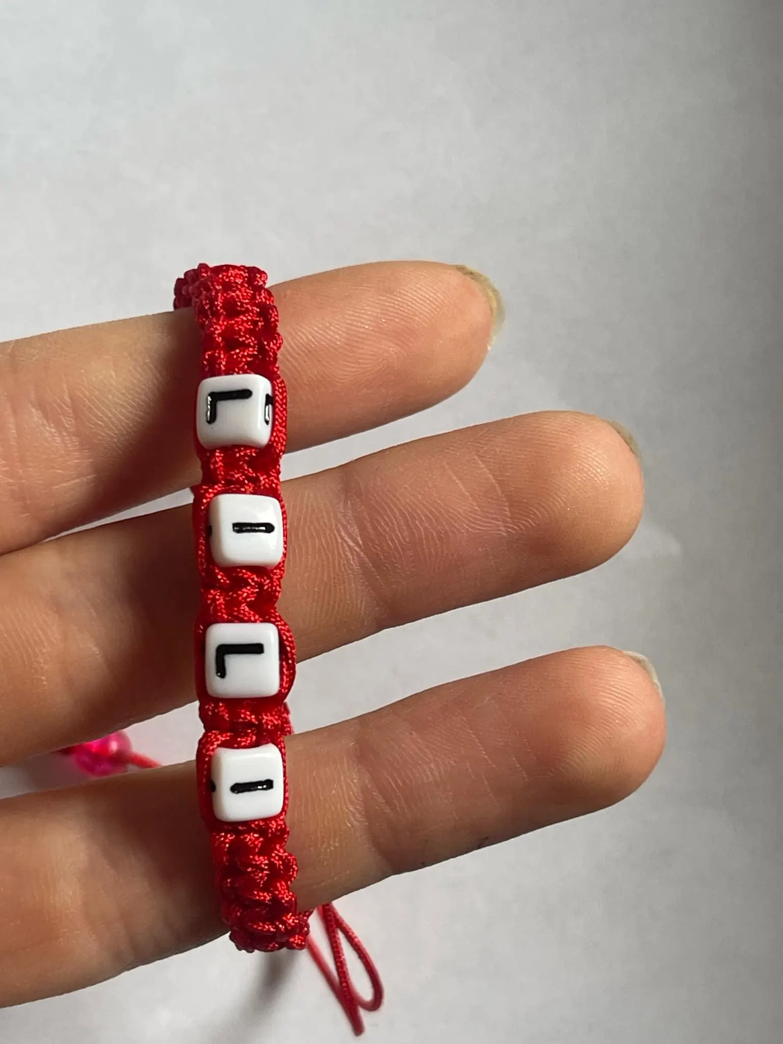 red personalized kids bracelet handmade with custom letter beads adjustable
