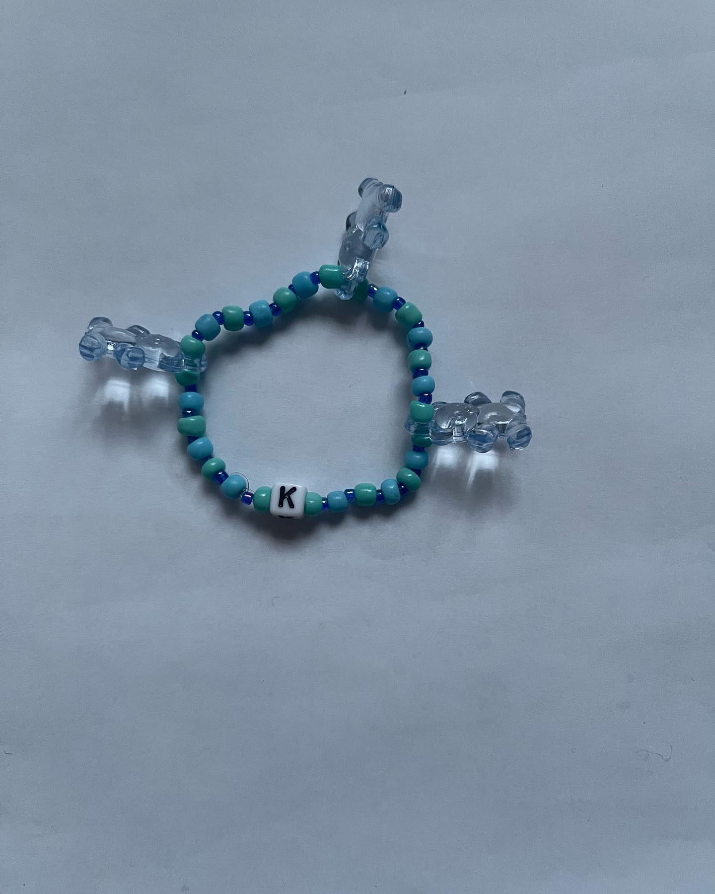 Handmade Personalized Blue Beaded Bracelet with Initial & Teddy Bear Charms - Image 2